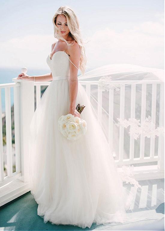 a line spaghetti strap wedding dress